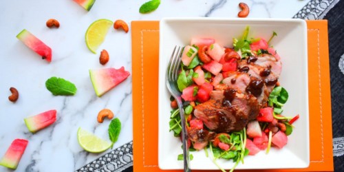 Duck and watermelon salad with watercress and cashew nuts.