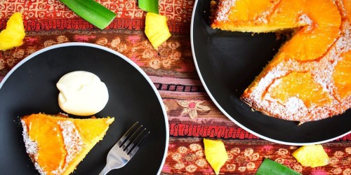 Indian pineapple upside down cake served with lightly whipped cream