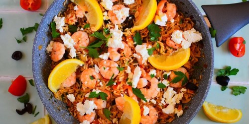 A delicious prawn pilaf with tomatoes, black olives, onions and herbs topped with feta cheese.