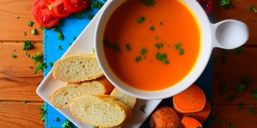 Sweet potato and tomato soup with crusty rolls
